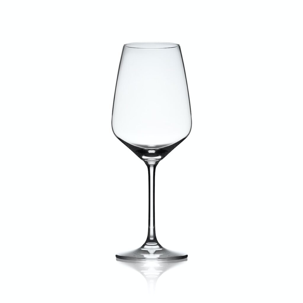 a clear wine glass on a white background
